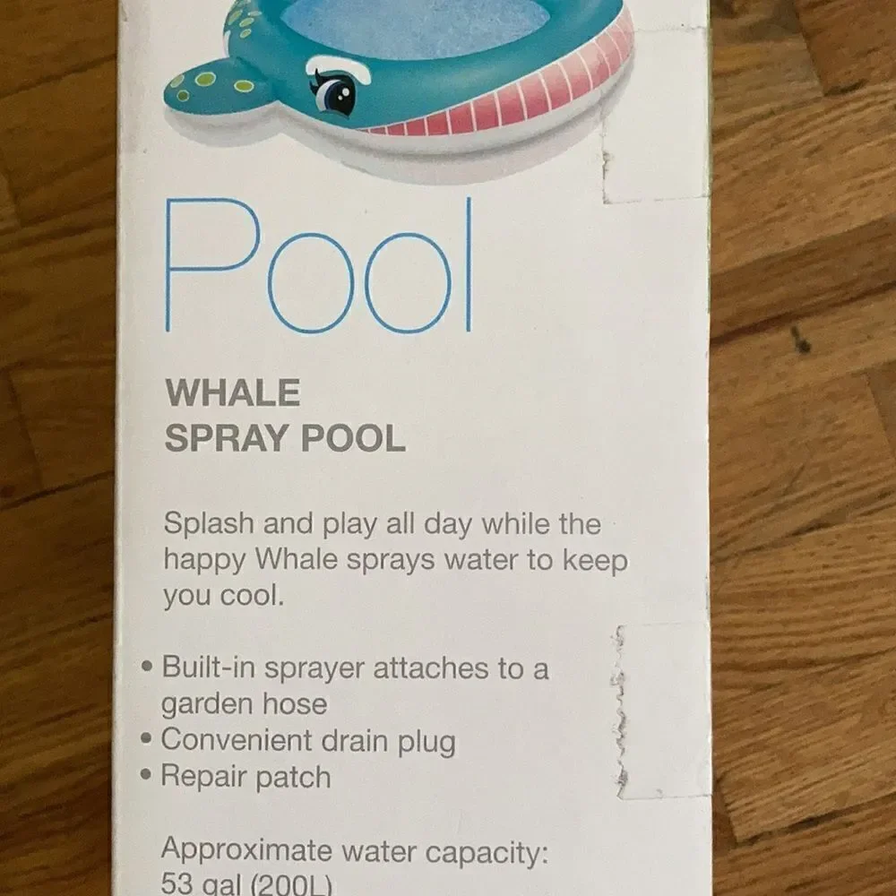 Whale Spraying Pool